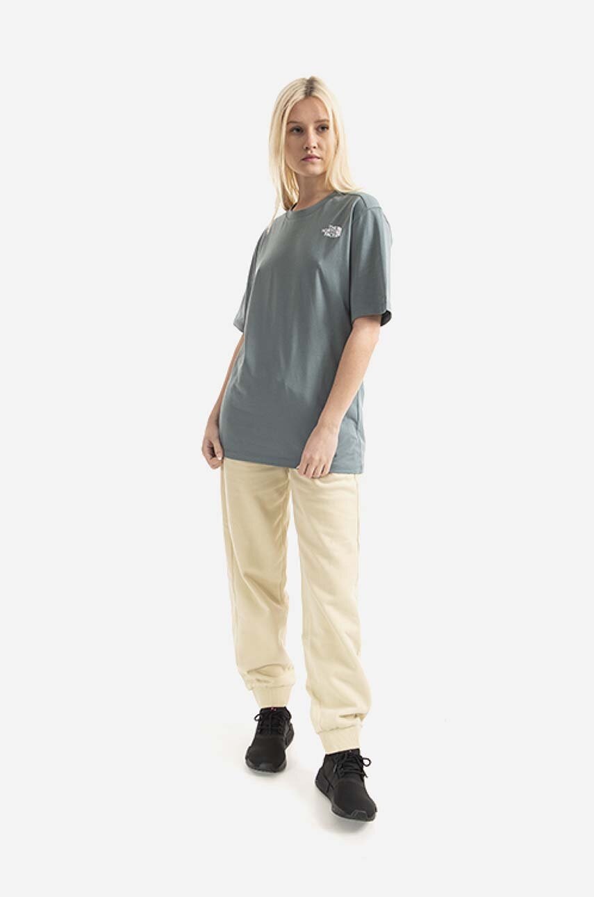 Βαμβακερό παντελόνι The North Face Oversized Jogger χρώμα: μπεζ φωτογραφία
