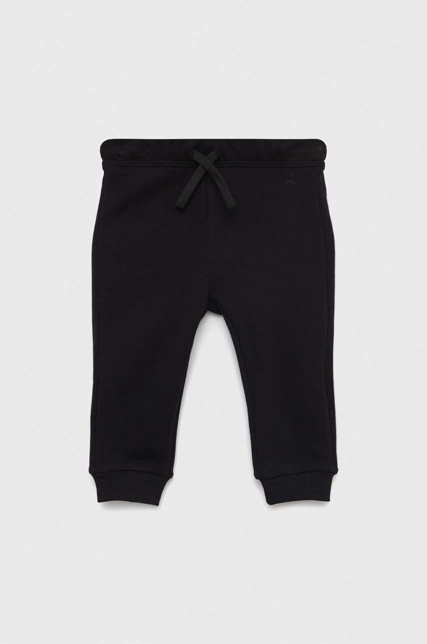 United Colors of Benetton pantaloni de trening din bumbac pentru copii culoarea negru, neted