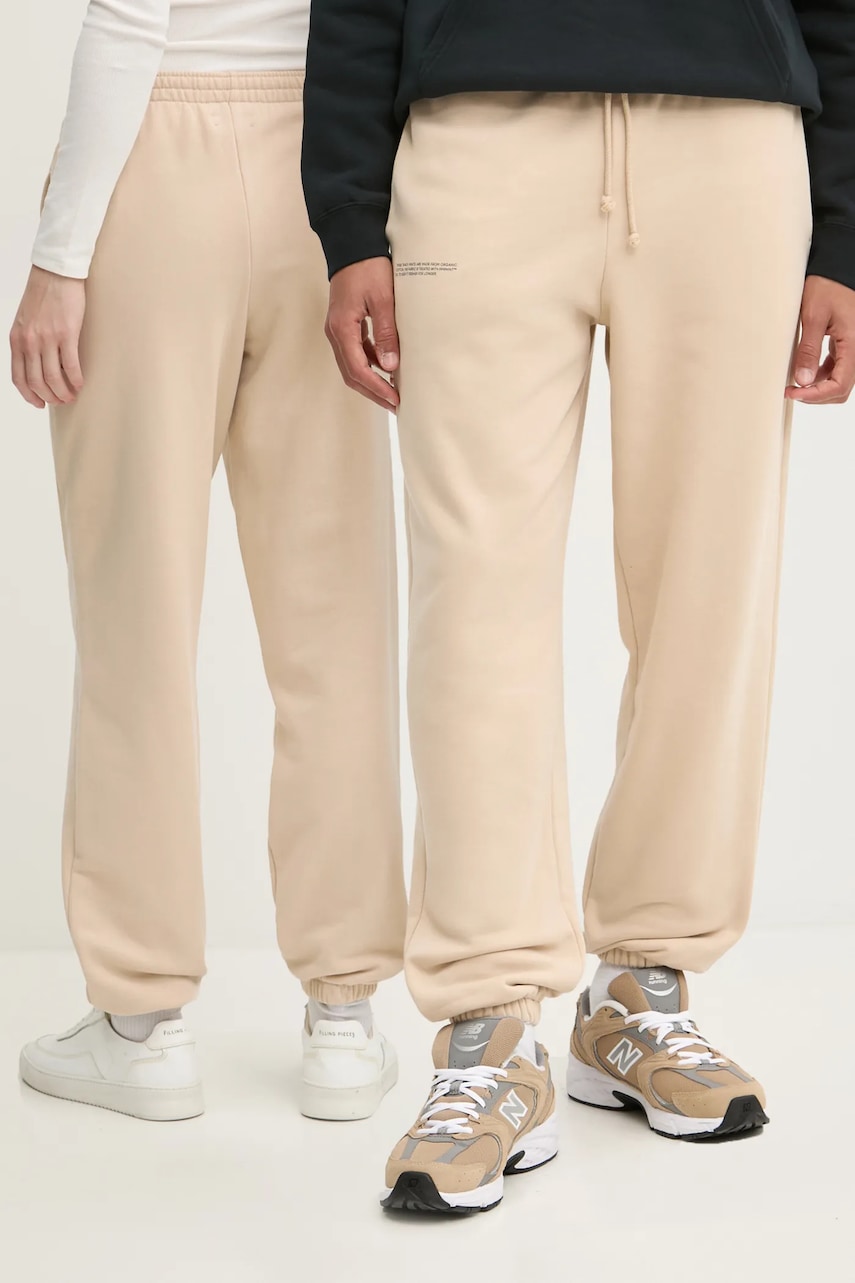 Pangaia pantaloni de trening din bumbac culoarea bej, neted