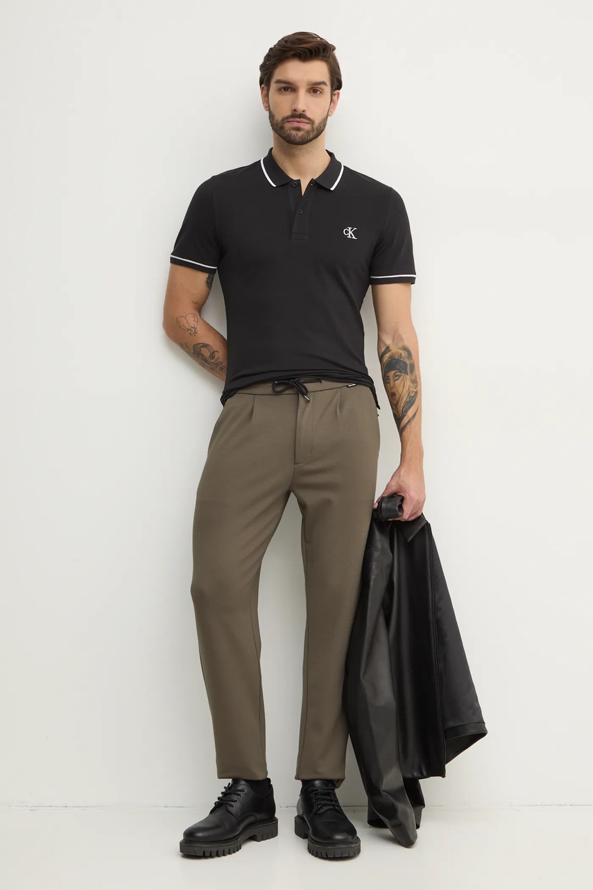Поло Calvin Klein Jeans мужской цвет чёрный однотонный J30J315603 Поло Calvin Klein Jeans мужской цвет чёрный однотонный J30J315603