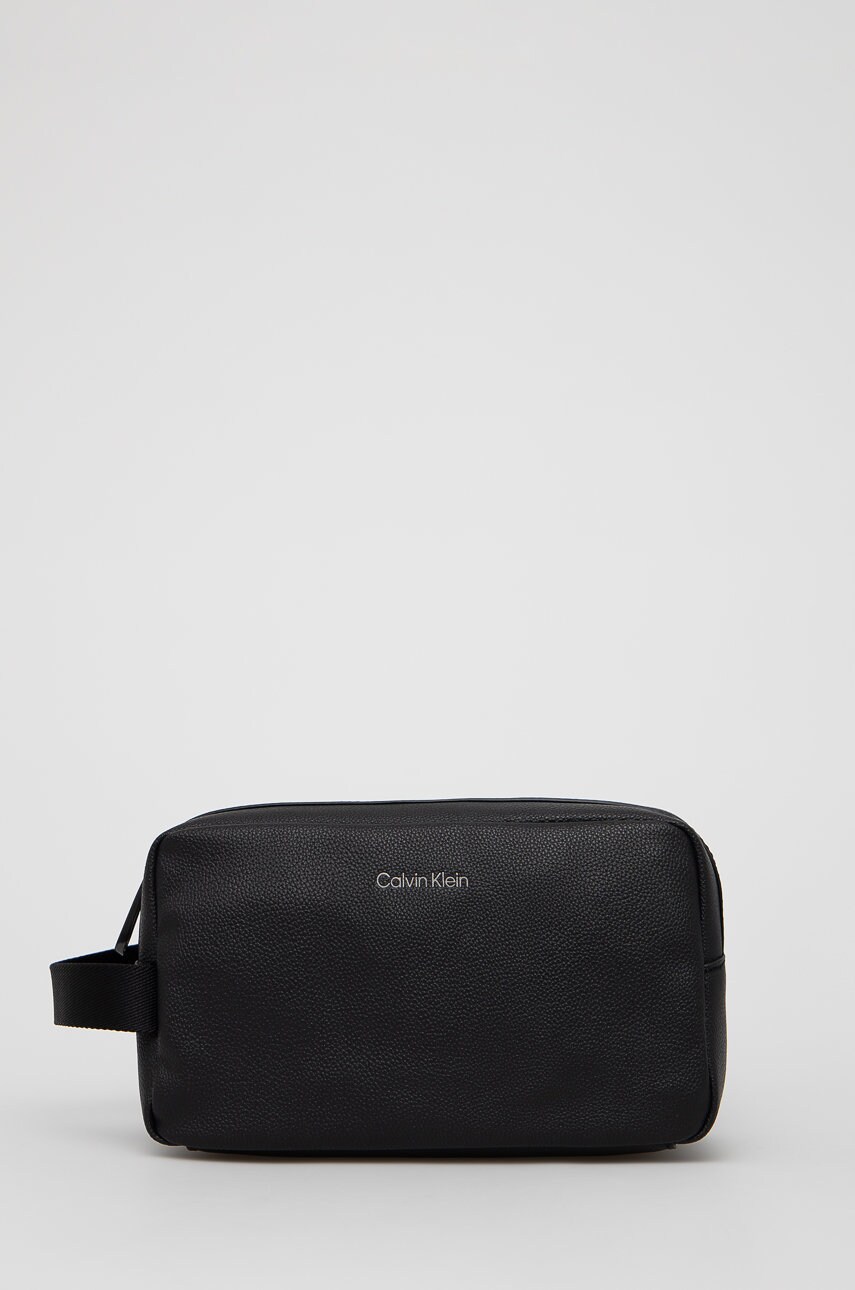 Levně Kosmetická taška Calvin Klein černá barva