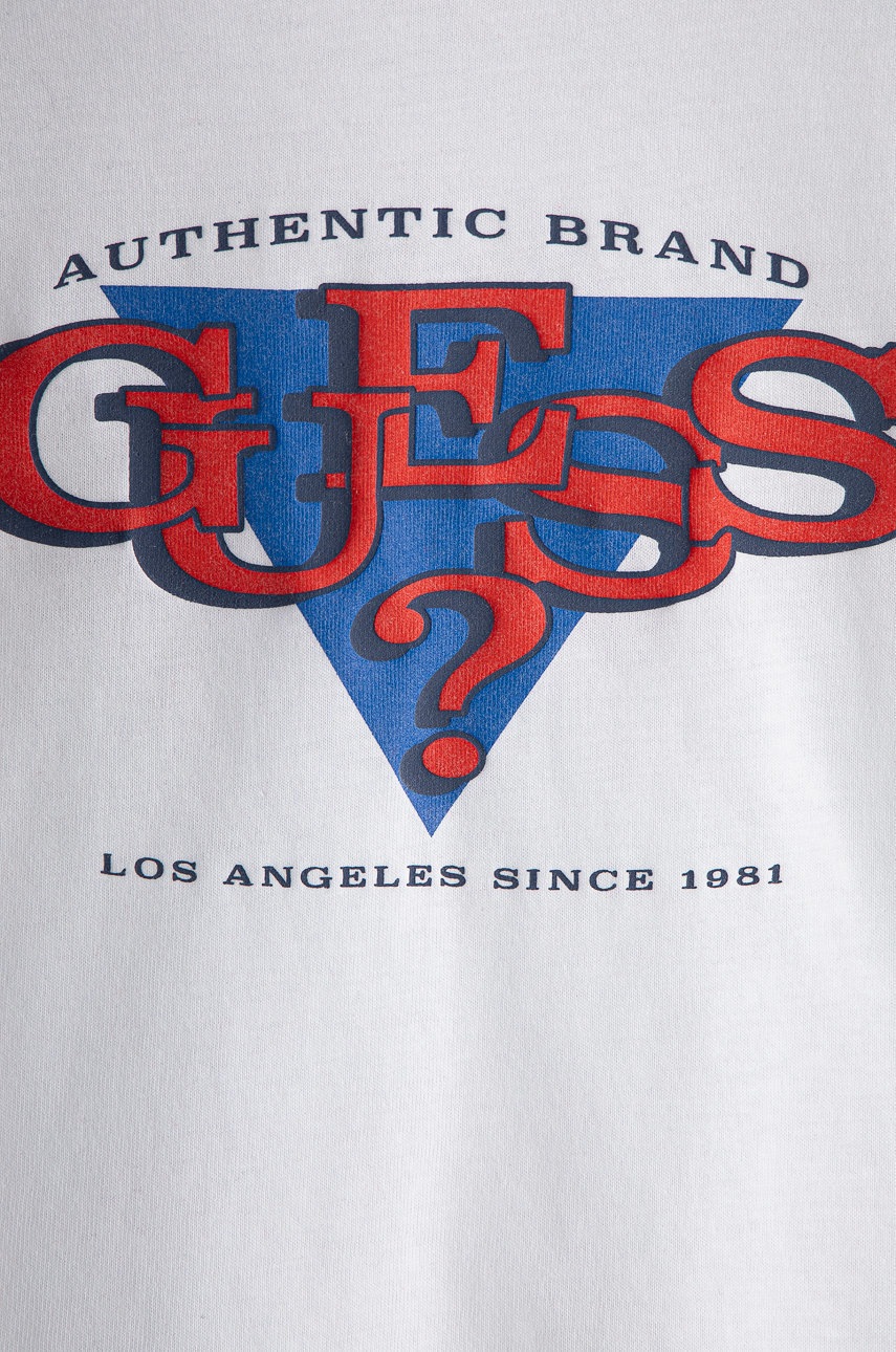 

Детский лонгслив Guess цвет белый с принтом