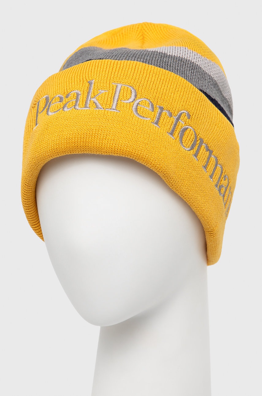 

Шерстяная шапка Peak Performance цвет жёлтый шерсть