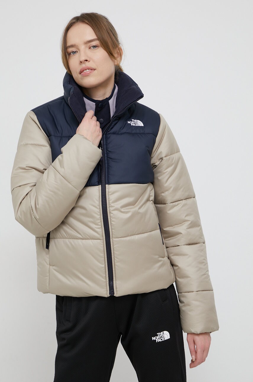 

Куртка The North Face жіноча колір кремовий зимова