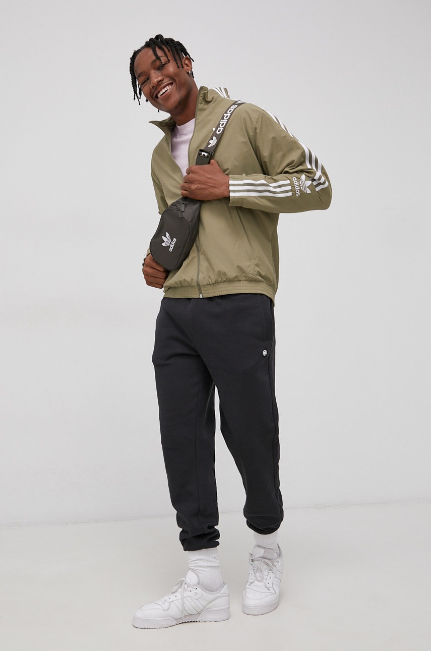 

Куртка adidas Originals колір жовтий перехідна