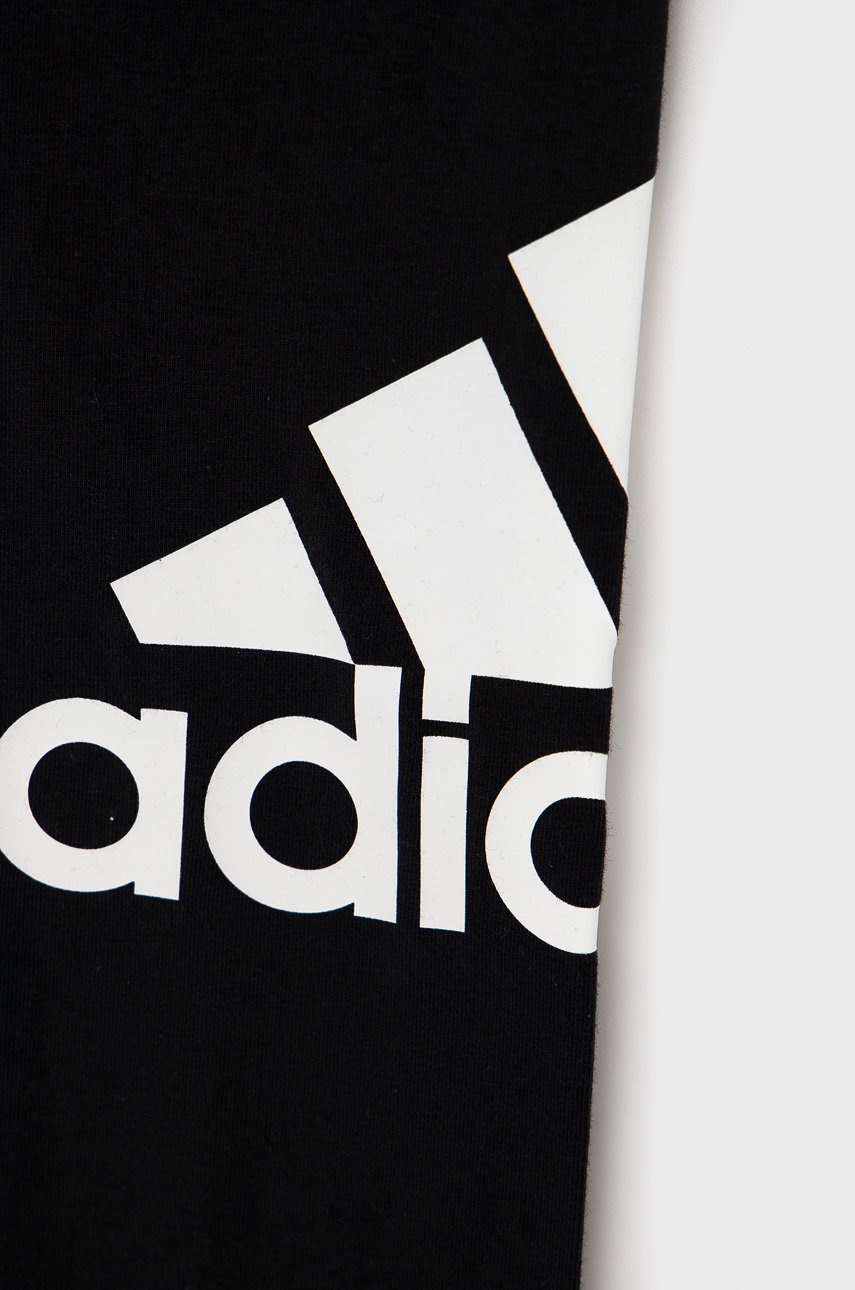 

Дитячі легінси adidas колір чорний з принтом