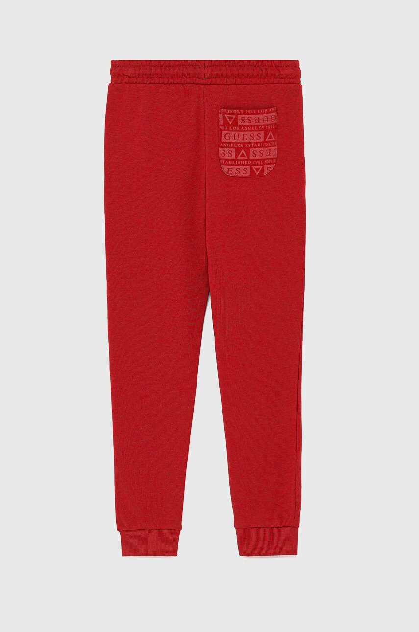 

Дитячі штани Guess колір червоний