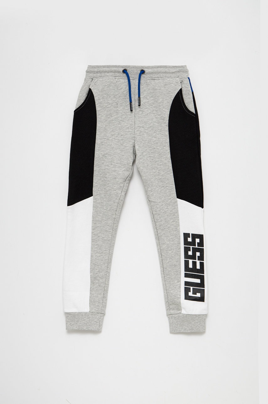

Детски панталон Guess в меланж на сиво, Сив