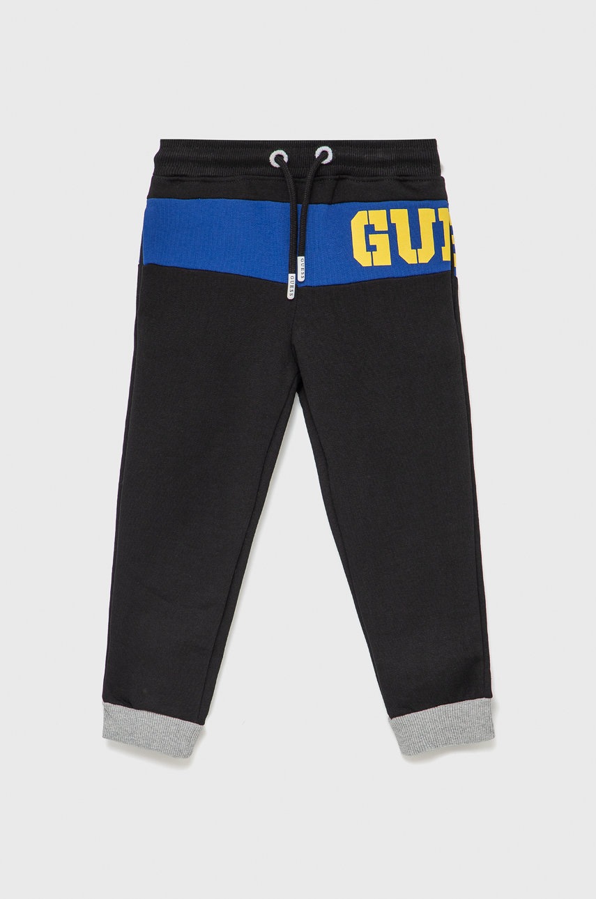 

Детски памучен панталон Guess в меланж на черно, Черен