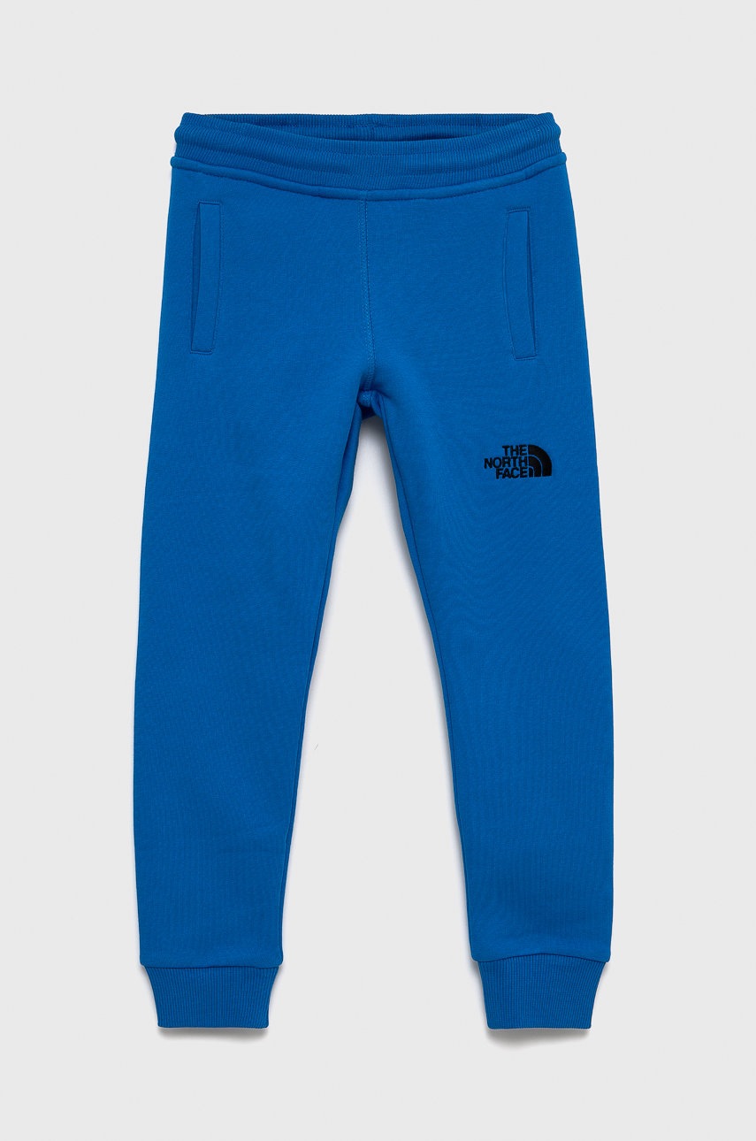 

Детски памучен панталон The North Face с апликация, Син