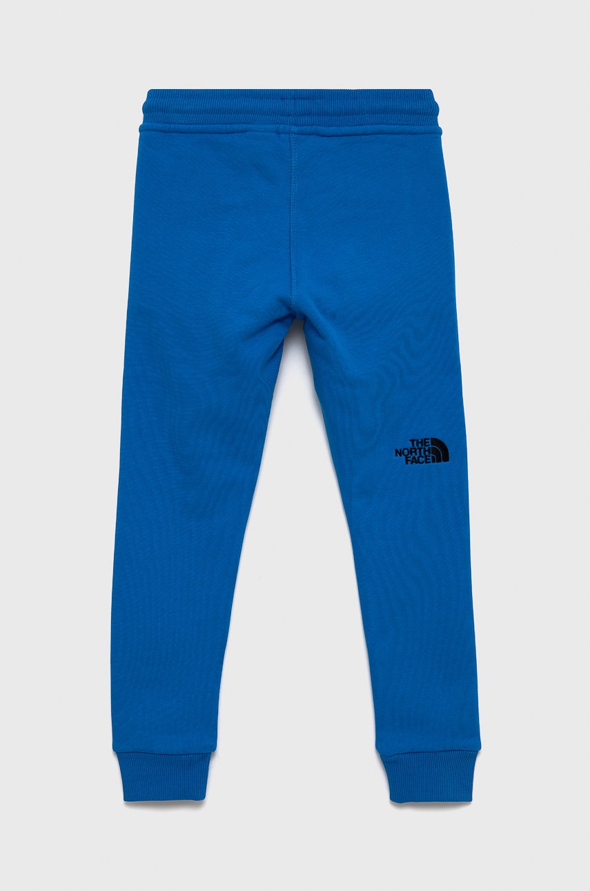 

Детские хлопковые брюки The North Face с аппликацией