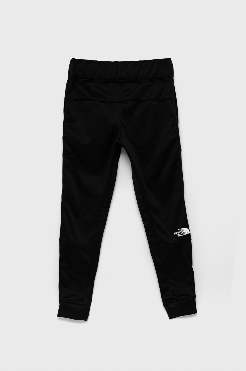 

Дитячі штани The North Face колір чорний з принтом