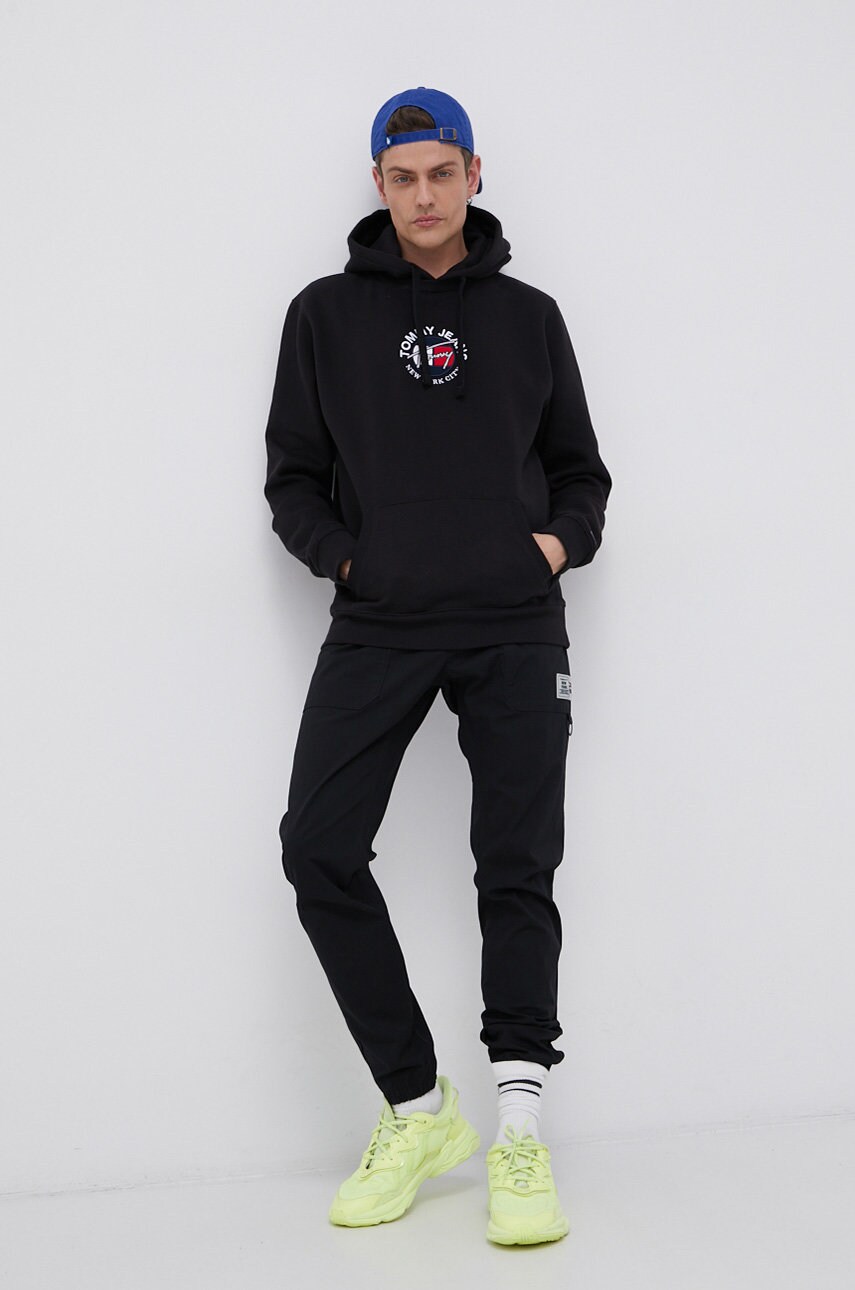 

Штани Tommy Jeans чоловічі колір чорний облягаюче