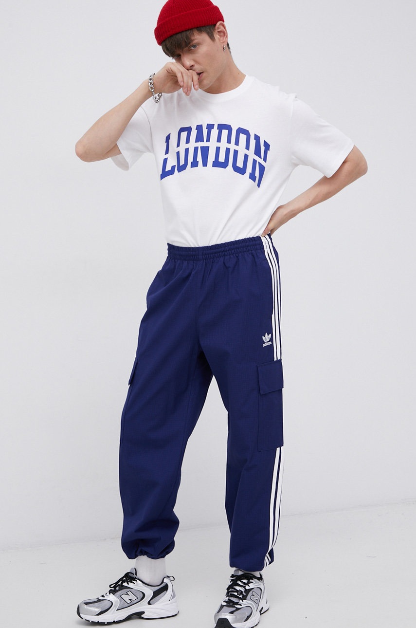 

Штани adidas Originals чоловічі колір синій фасон jogger
