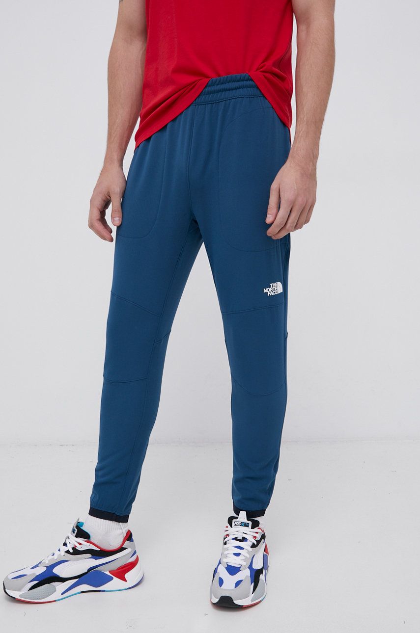 The North Face Pantaloni bărbați, culoarea turcoaz, jogger answear imagine noua