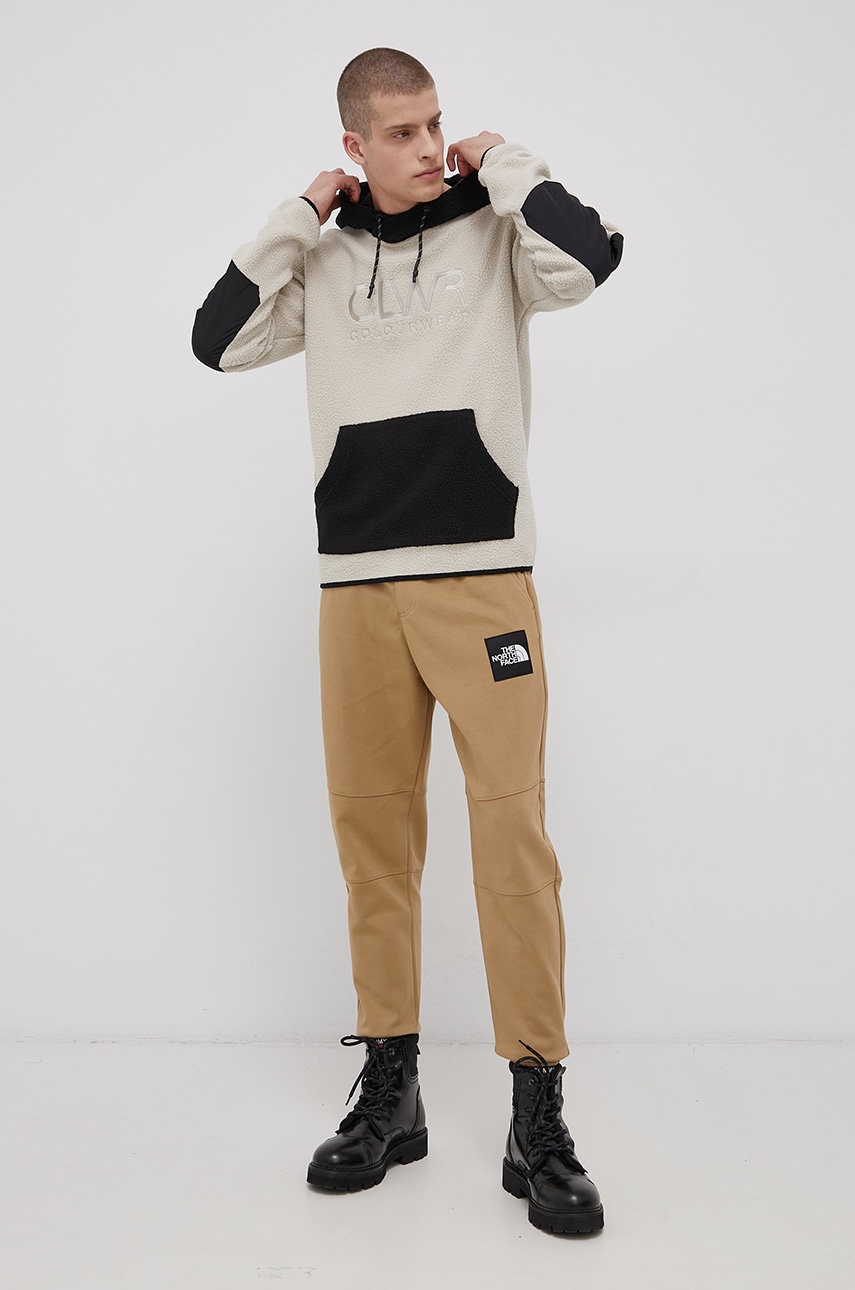 

Штани The North Face чоловічі колір жовтий гладке