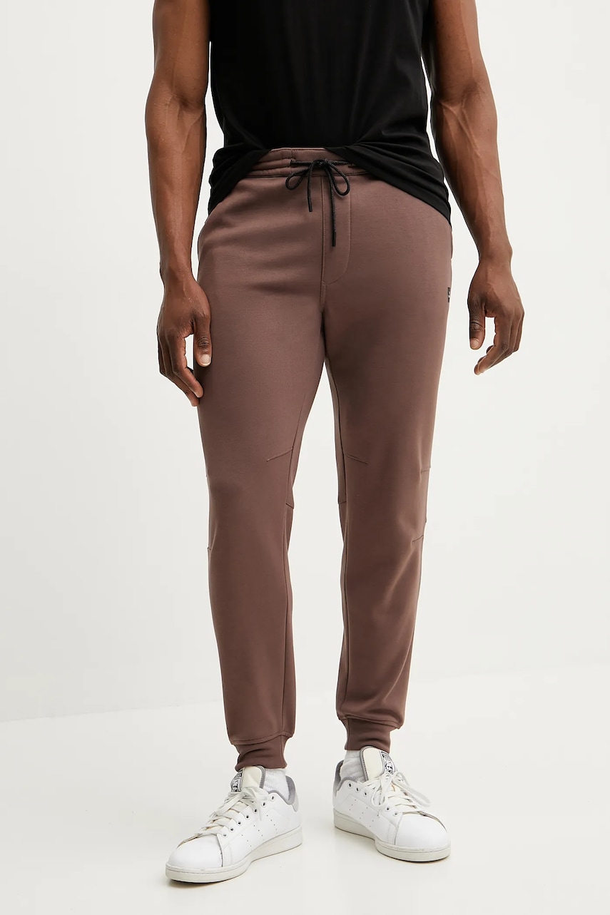 Rip Curl pantaloni de trening culoarea portocaliu, neted Rip Curl pantaloni de trening culoarea portocaliu, neted