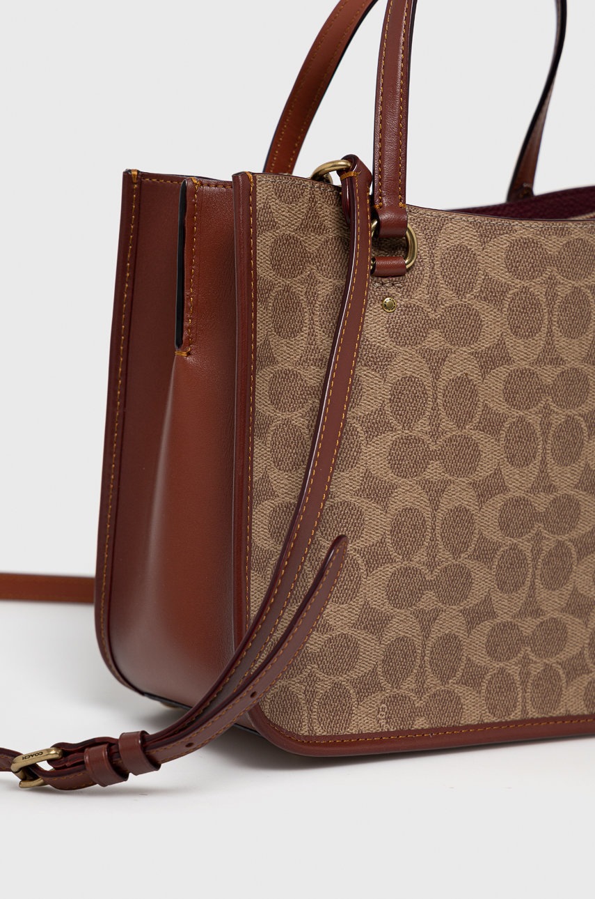 

Шкіряна сумочка Coach колір коричневий