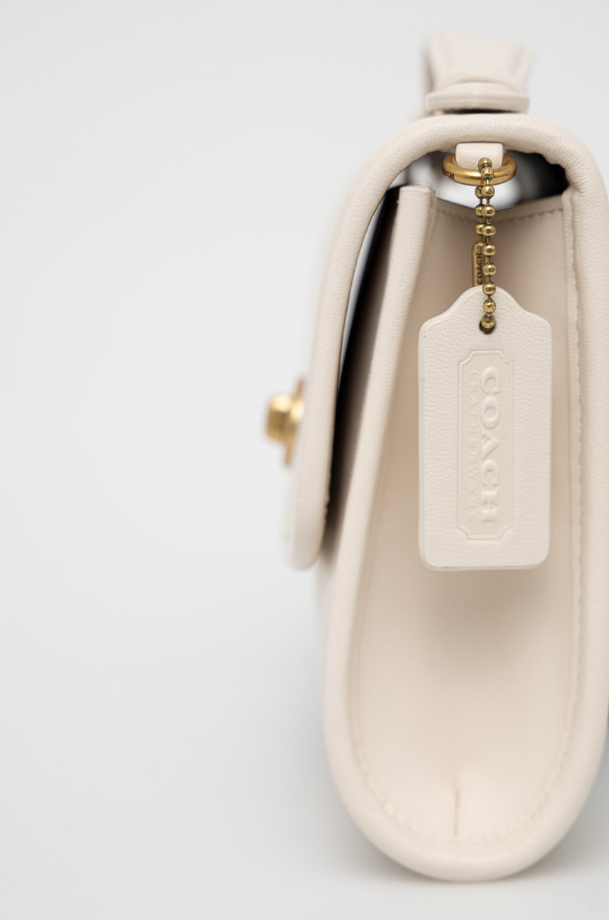 

Шкіряна сумочка Coach колір кремовий