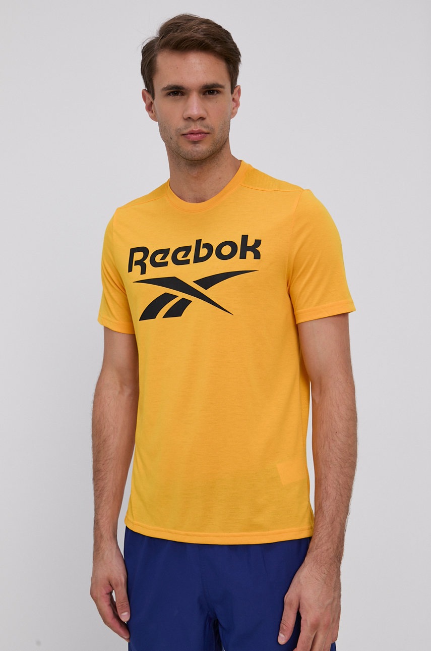 

Футболка Reebok GT5759 мужская цвет жёлтый с принтом
