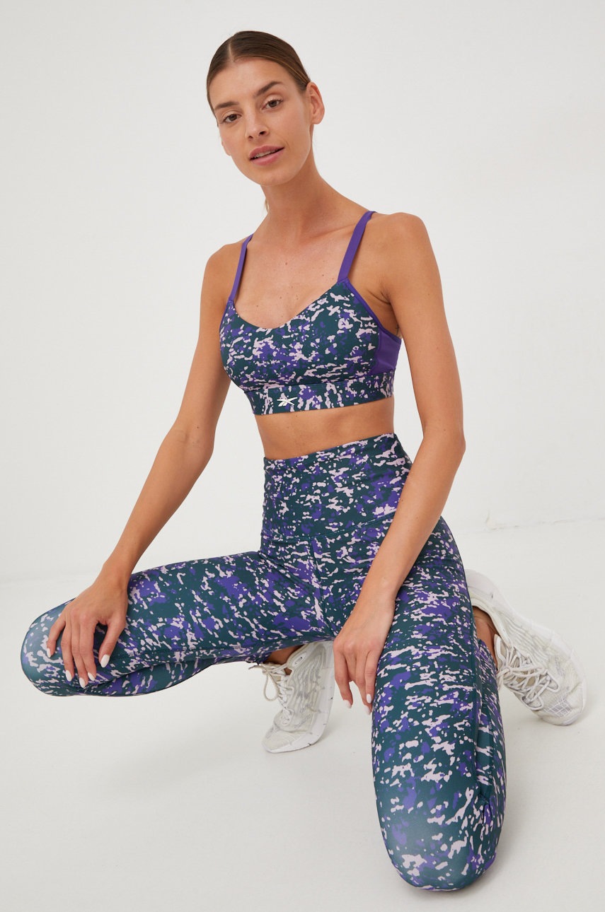 

Спортивний бюстгальтер Reebok Lux Speckle Modern Safari колір фіолетовий візерунок