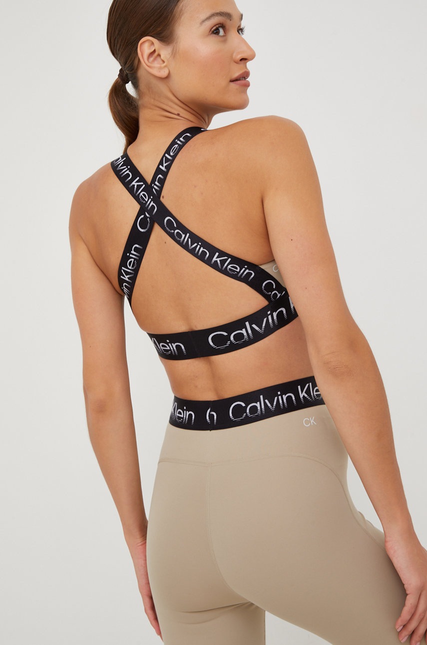 

Спортен сутиен Calvin Klein Performance Big Idea в бежово, Бежов