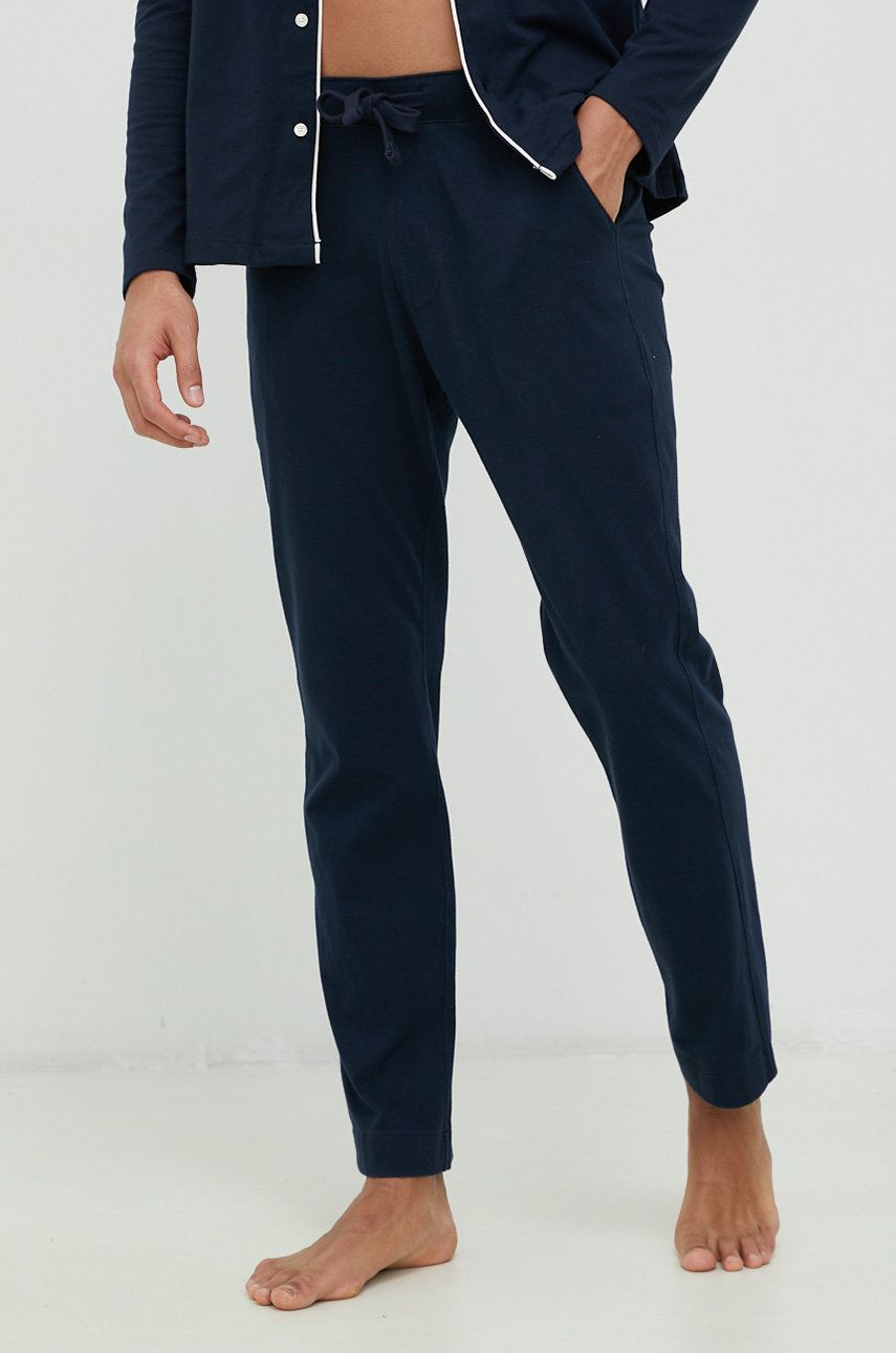 Bavlněné pyžamové kalhoty Abercrombie & Fitch tmavomodrá barva - námořnická modř -  100 % Bavln