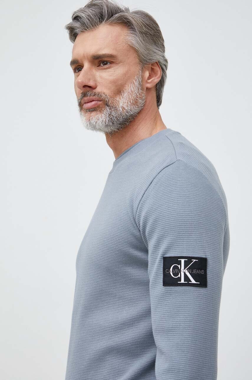 

Памучен пуловер Calvin Klein Jeans в сиво, Сив