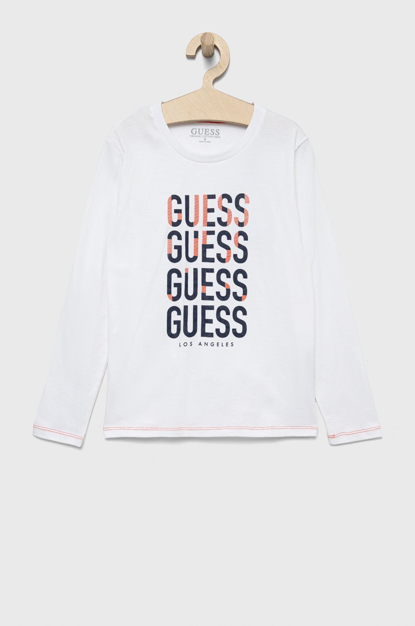 

Дитячий бавовняний лонгслів Guess колір білий з принтом