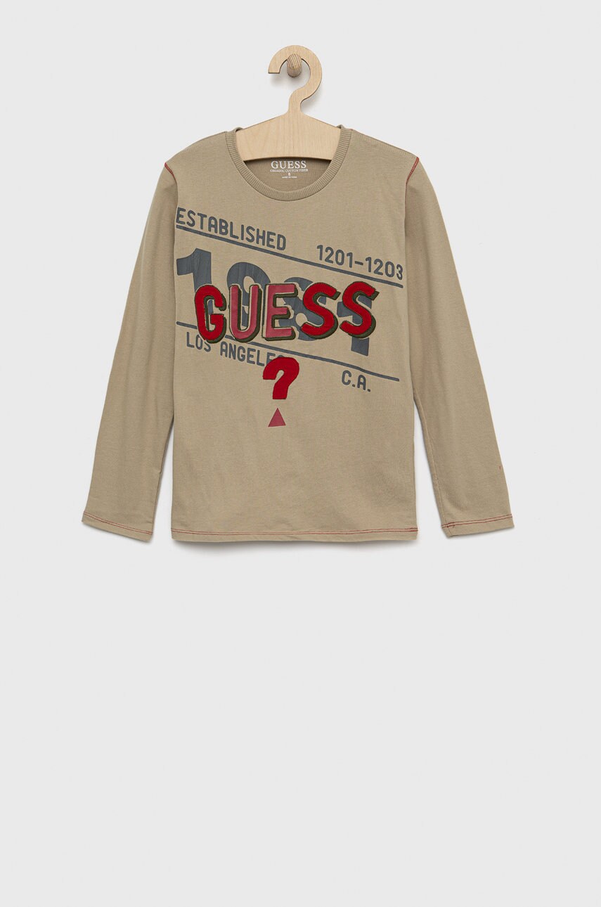 

Хлопковый детский лонгслив Guess цвет бежевый с аппликацией