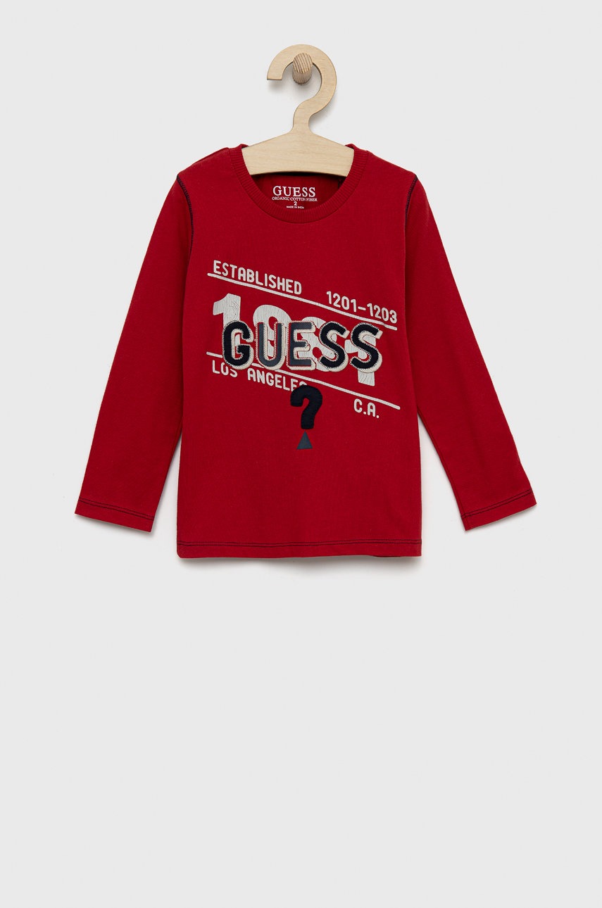 

Хлопковый детский лонгслив Guess цвет красный с аппликацией