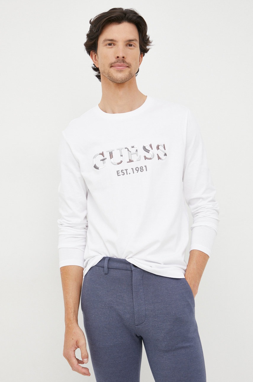 

Бавовняний лонгслів Guess колір білий однотонний