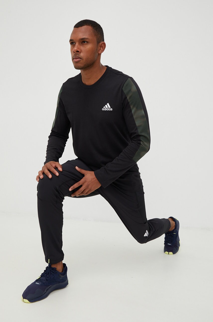 

Хлопковый лонгслив adidas цвет чёрный однотонный