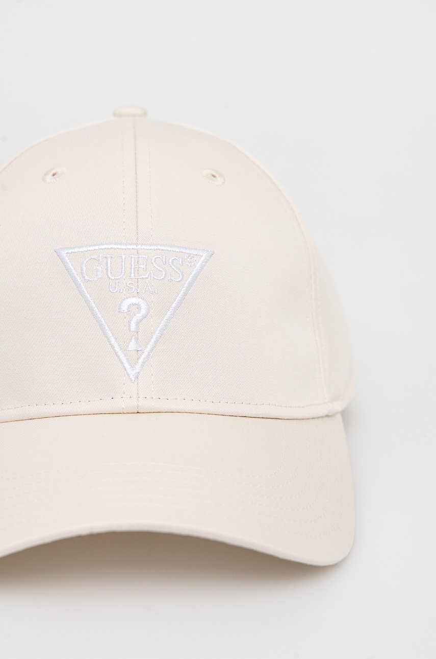 

Бавовняна кепка Guess колір бежевий з аплікацією