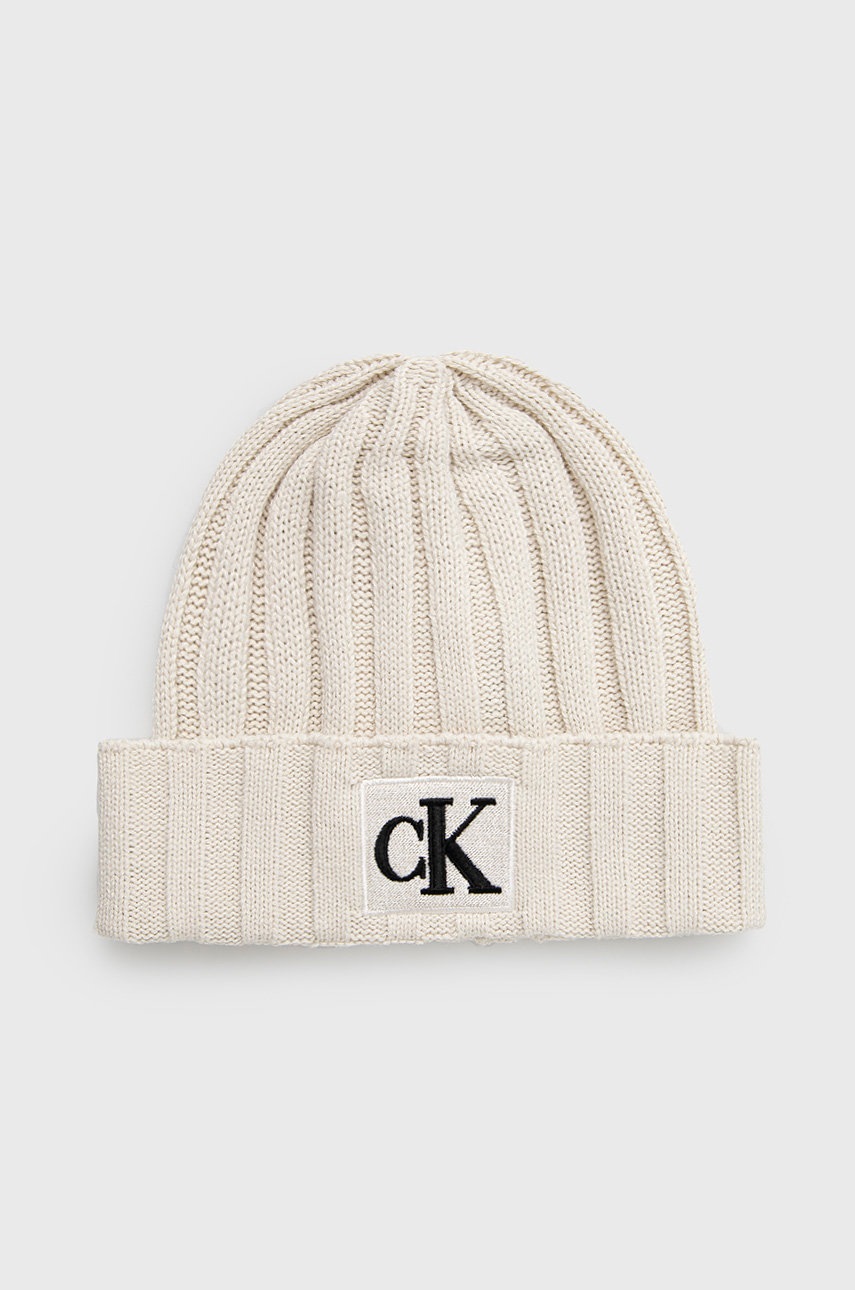 

Детска шапка Calvin Klein Jeans в бежово с фина плетка, Бежов