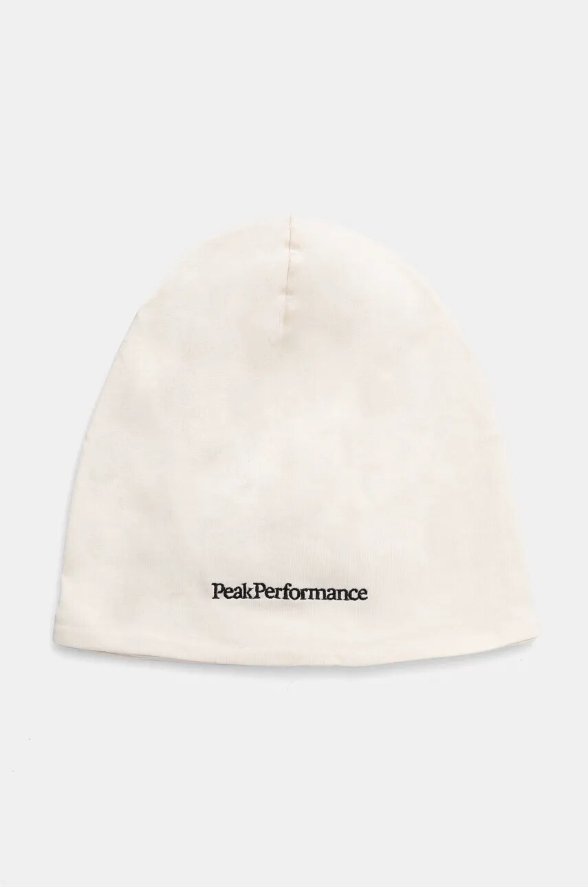 Levně Bavlněná čepice Peak Performance béžová barva, z tenké pleteniny