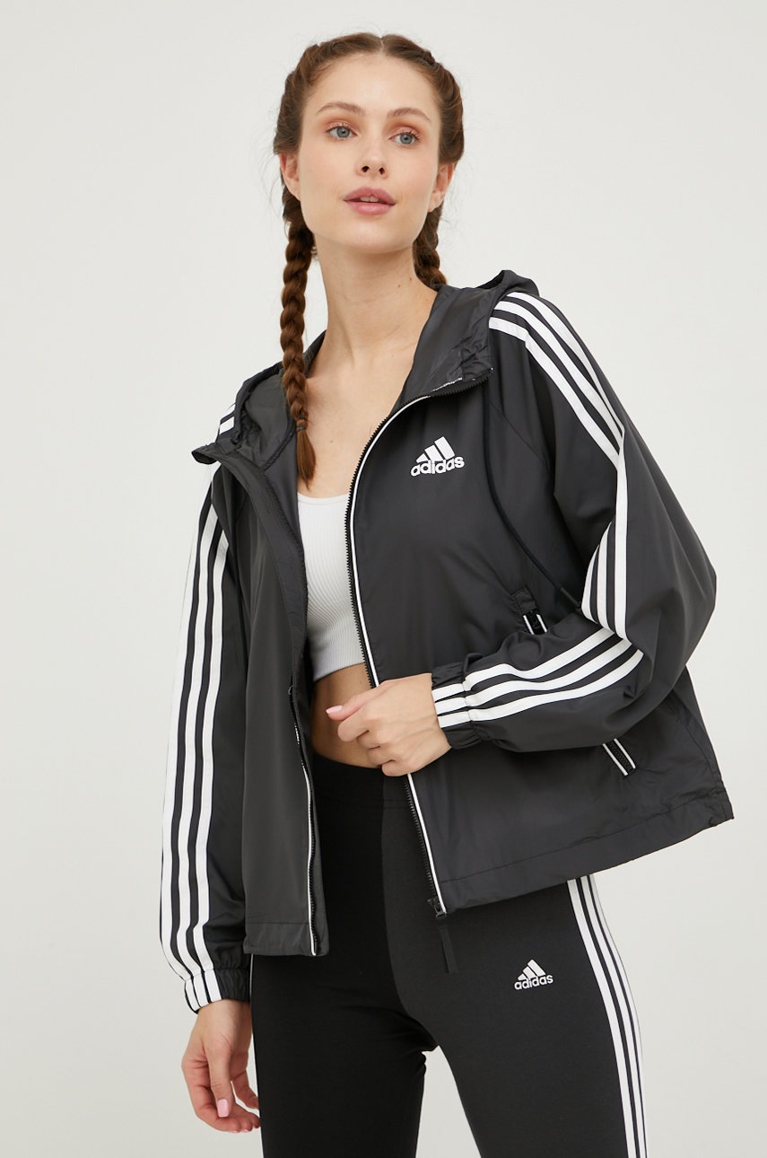 Bunda adidas Performance dámská, černá barva, přechodná, oversize - černá -  100 % Recyklovaný 