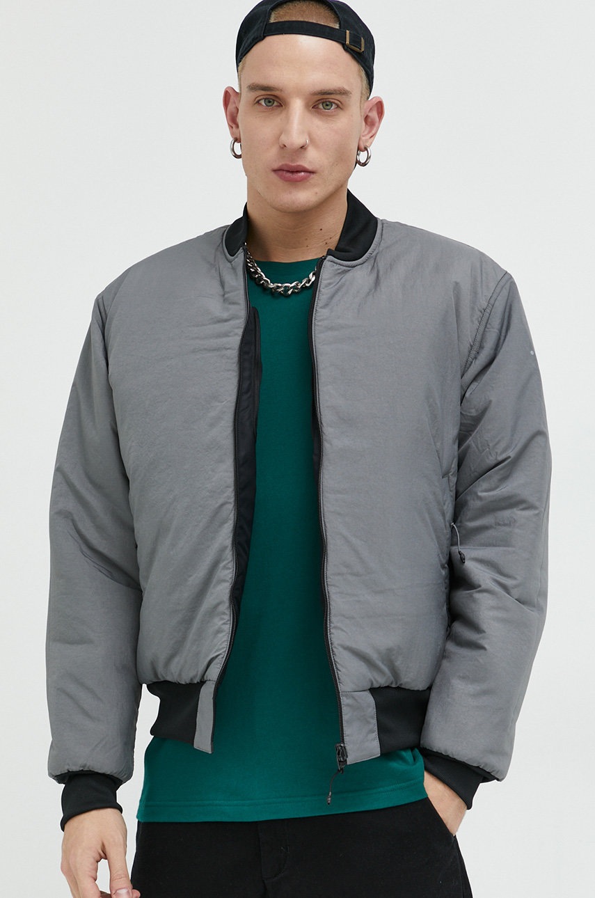 

Двостороння куртка-бомбер adidas Originals чоловіча колір чорний перехідна oversize