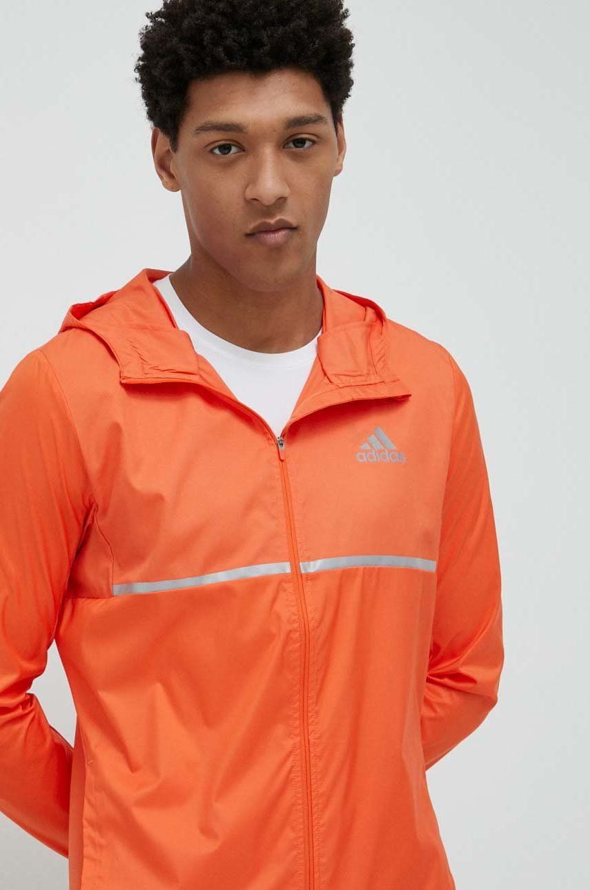 Adidas Performance windbreaker Own the Run culoarea portocaliu, de tranzitie adidas imagine noua