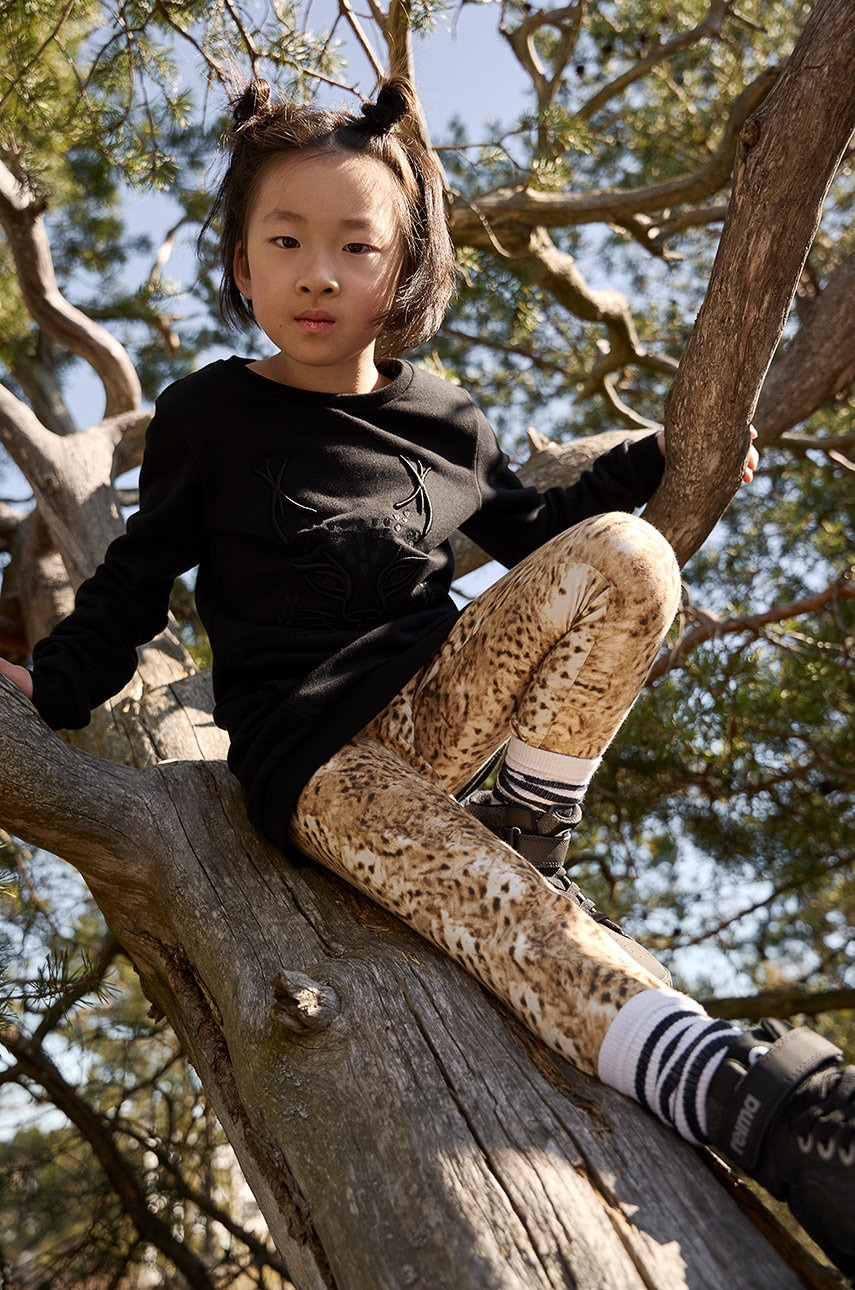 Дитячі легінси Reima колір жовтий візерунок Дитячі легінси Reima колір жовтий візерунок