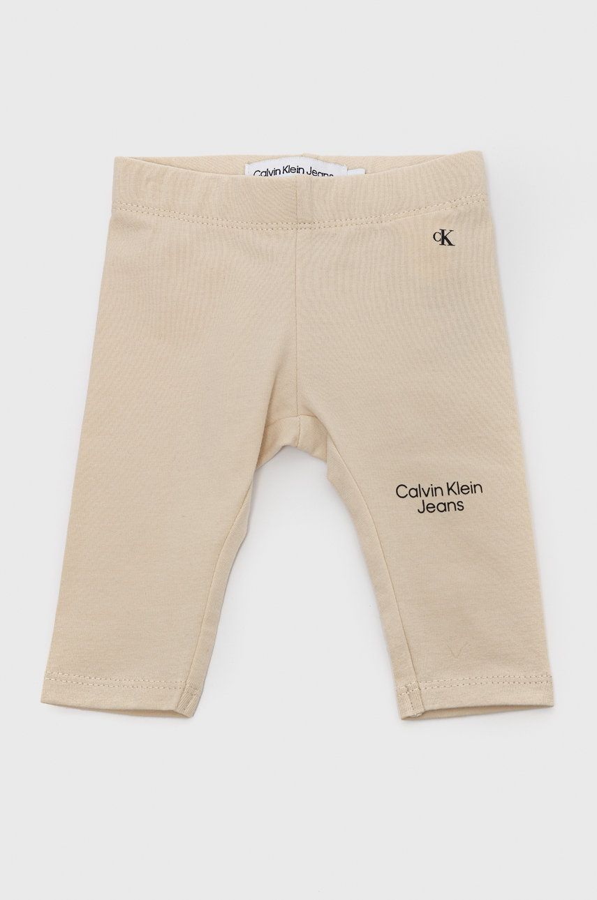 Calvin Klein Jeans legginsy dziecięce IN0IN00008.9BYY kolor beżowy gładkie