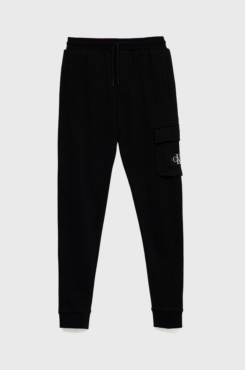 Calvin Klein Jeans spodnie dresowe dziecięce IB0IB01190.9BYY kolor czarny gładkie