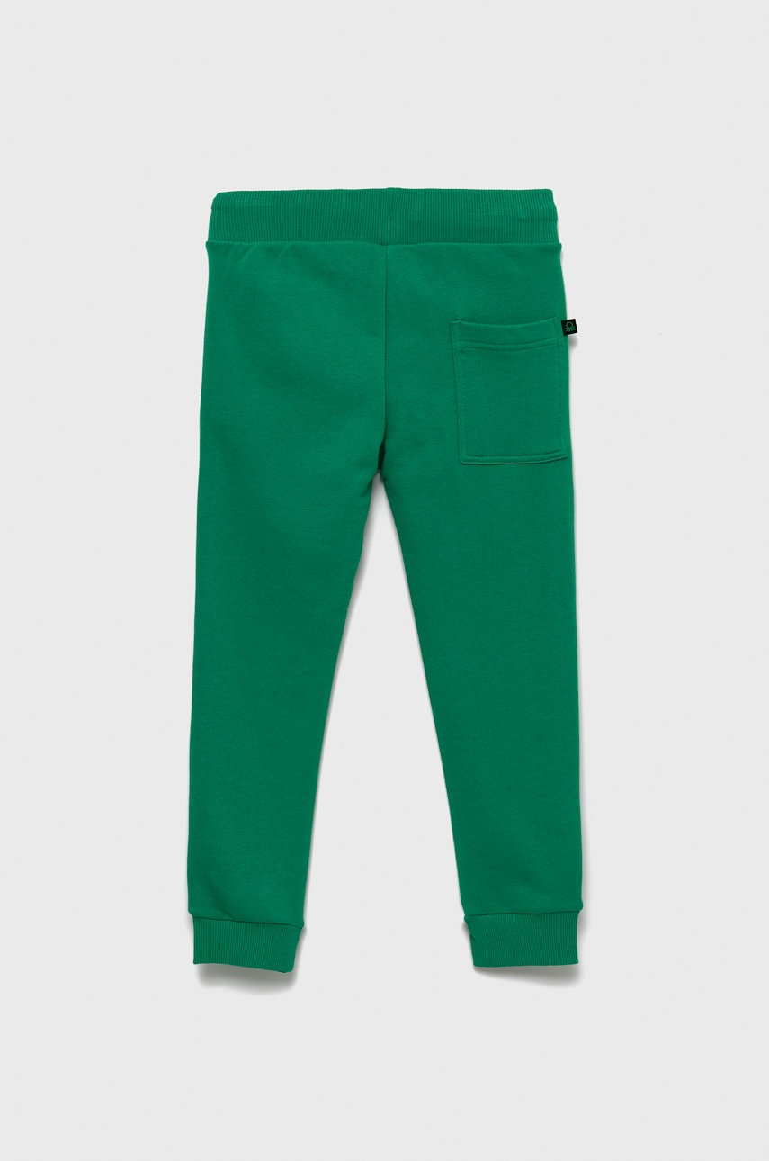 

Детские хлопковые штаны United Colors of Benetton цвет зелёный однотонные