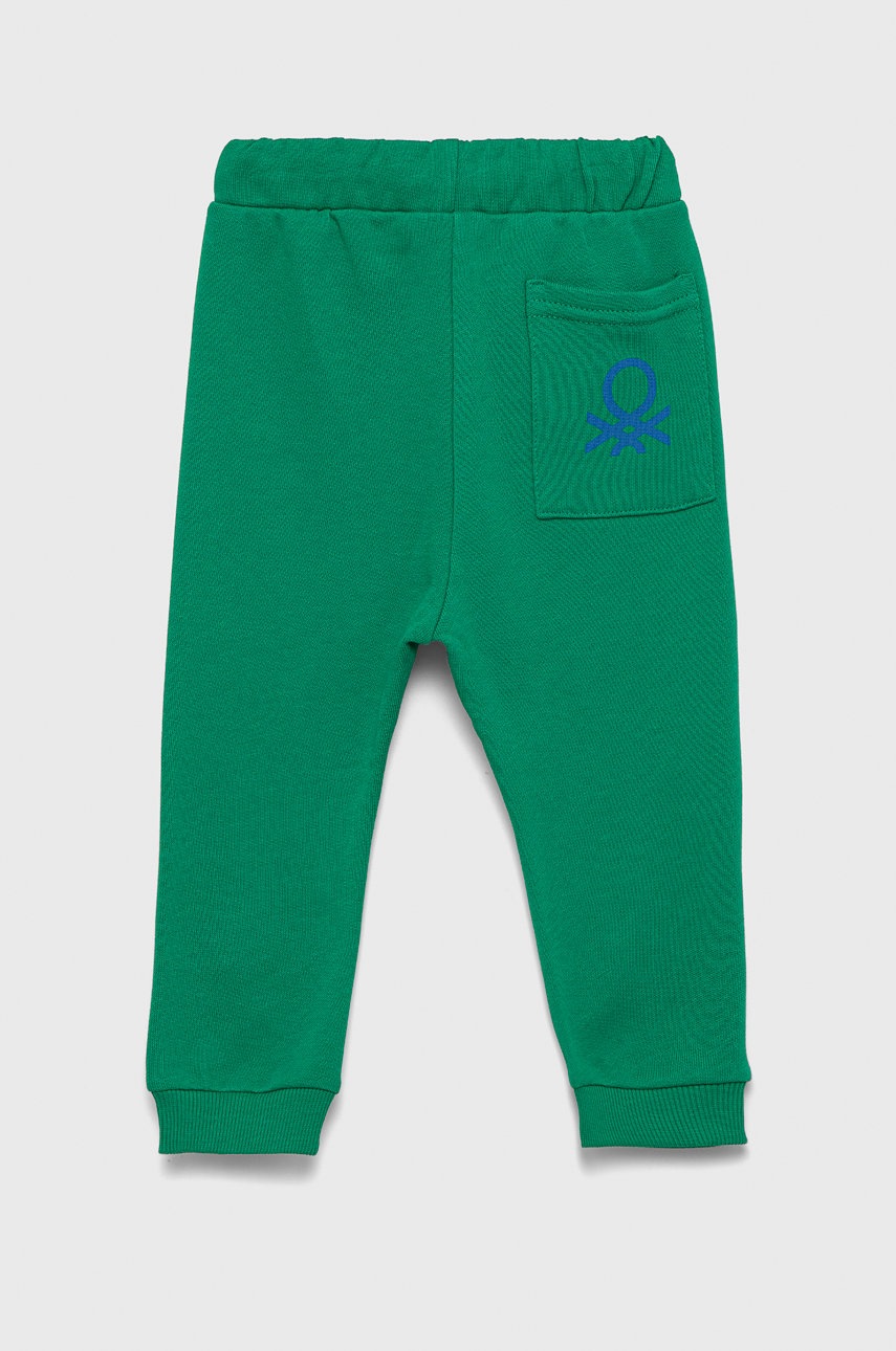 

Детские хлопковые штаны United Colors of Benetton цвет зелёный однотонные