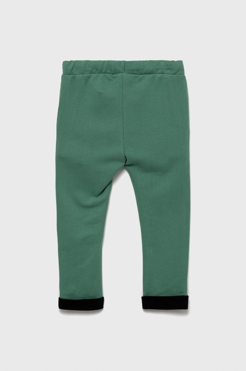 

Детские хлопковые штаны United Colors of Benetton цвет зелёный однотонные