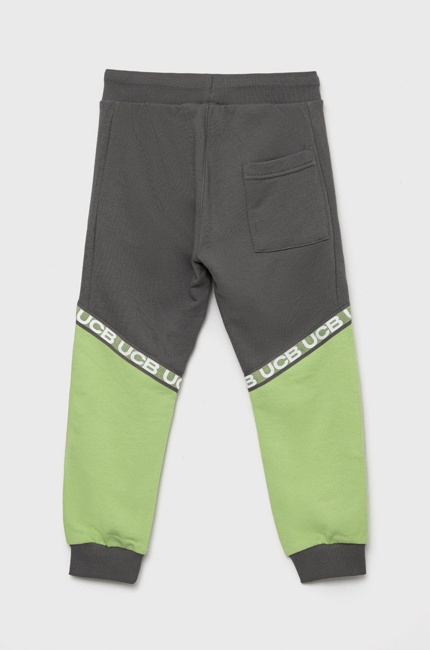 

Детские хлопковые штаны United Colors of Benetton цвет серый однотонные