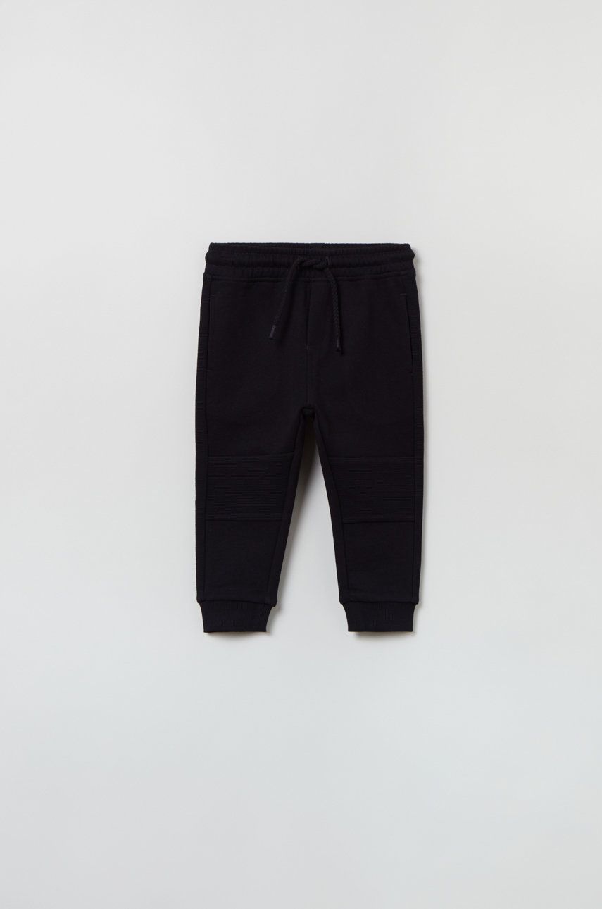 OVS pantaloni de trening pentru bebeluși culoarea negru, neted