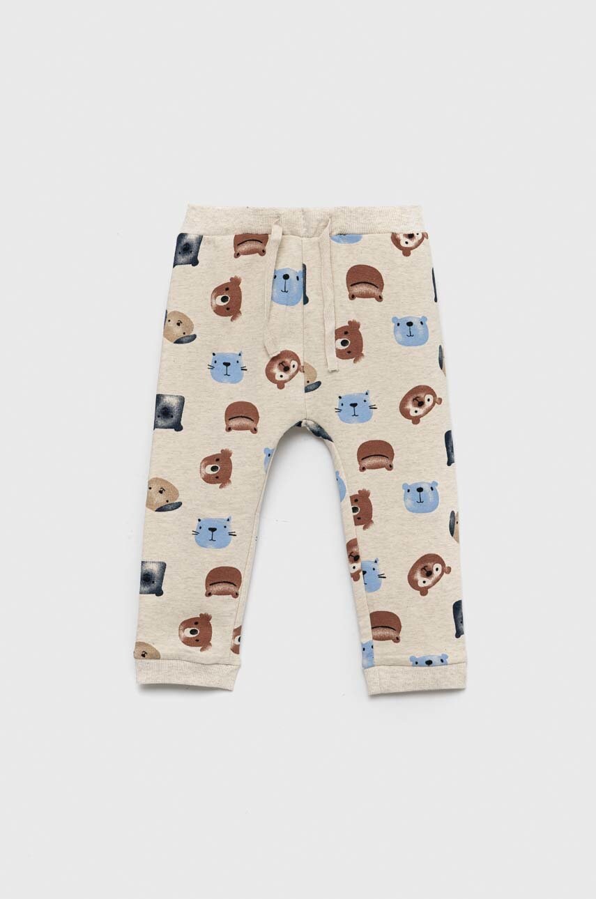 Детские спортивные штаны Name it цвет бежевый с узором Детские спортивные штаны Name it цвет бежевый с узором