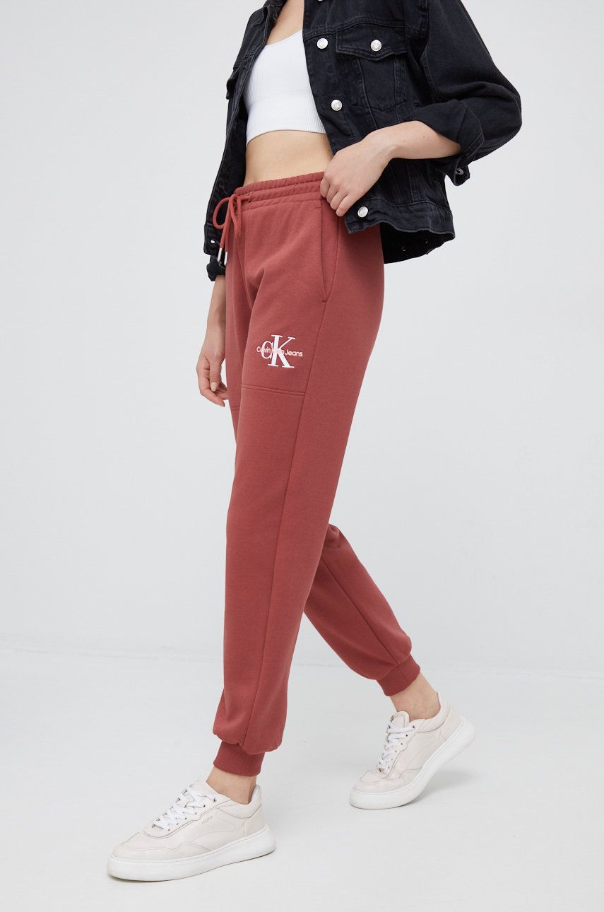 Calvin Klein Jeans spodnie dresowe damskie kolor czerwony gładkie