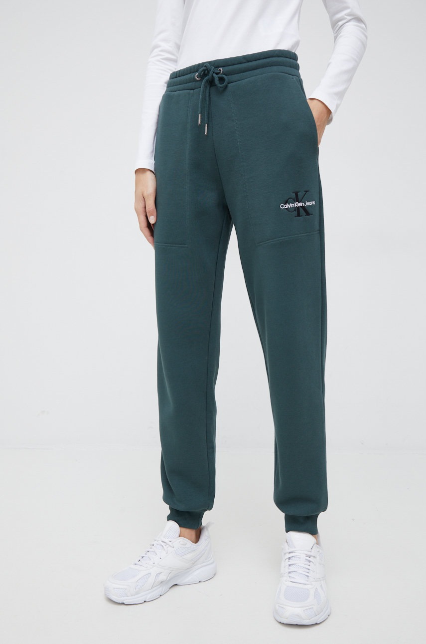 

Спортен панталон Calvin Klein Jeans в зелено с изчистен дизайн, Зелен
